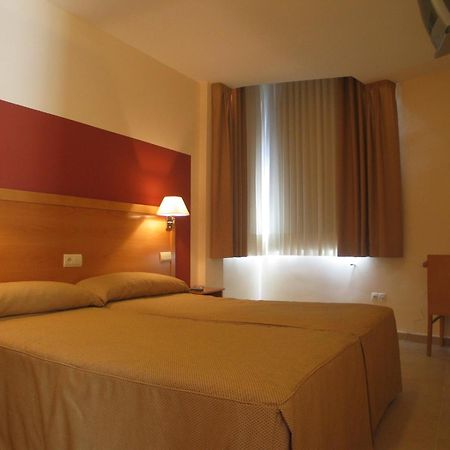 Hostal Ciudad De Caparra Каркабосо Номер фото