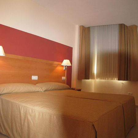 Hostal Ciudad De Caparra Каркабосо Номер фото